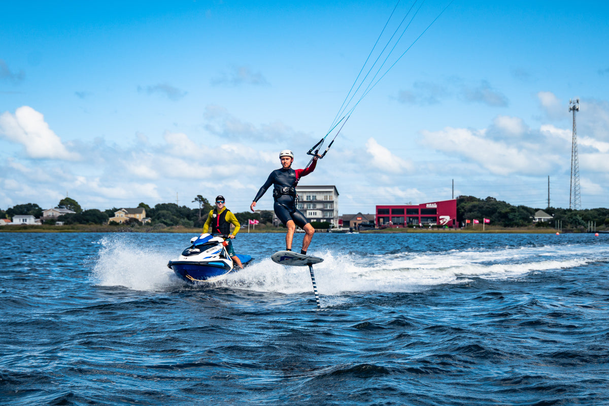 Student progressing through kite foil coaching