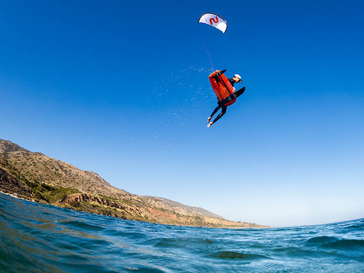 Slingshot UFO V4 Kite - rider jumping on foil