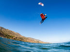 Slingshot UFO V4 Kite - rider jumping on foil
