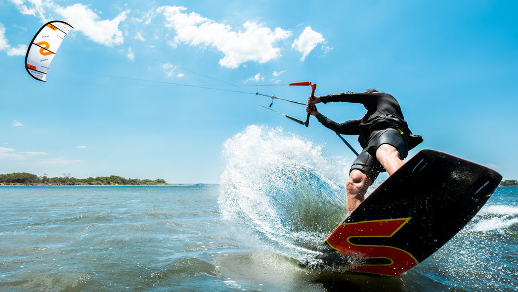 Slingshot Code V3 Kite - rider carving a turn