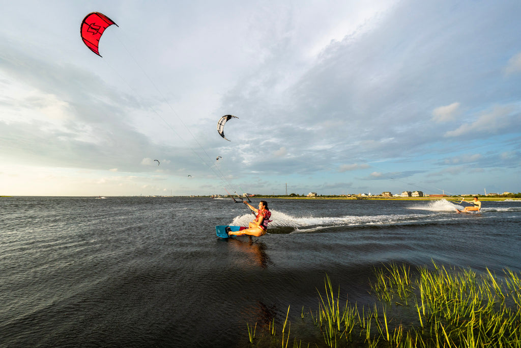 Zero to Hero kite camp student riding on the water