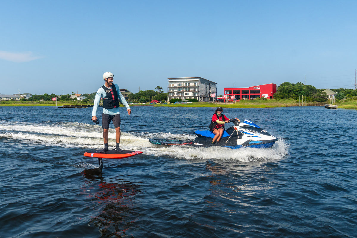 Student learning to eFoil on flat water