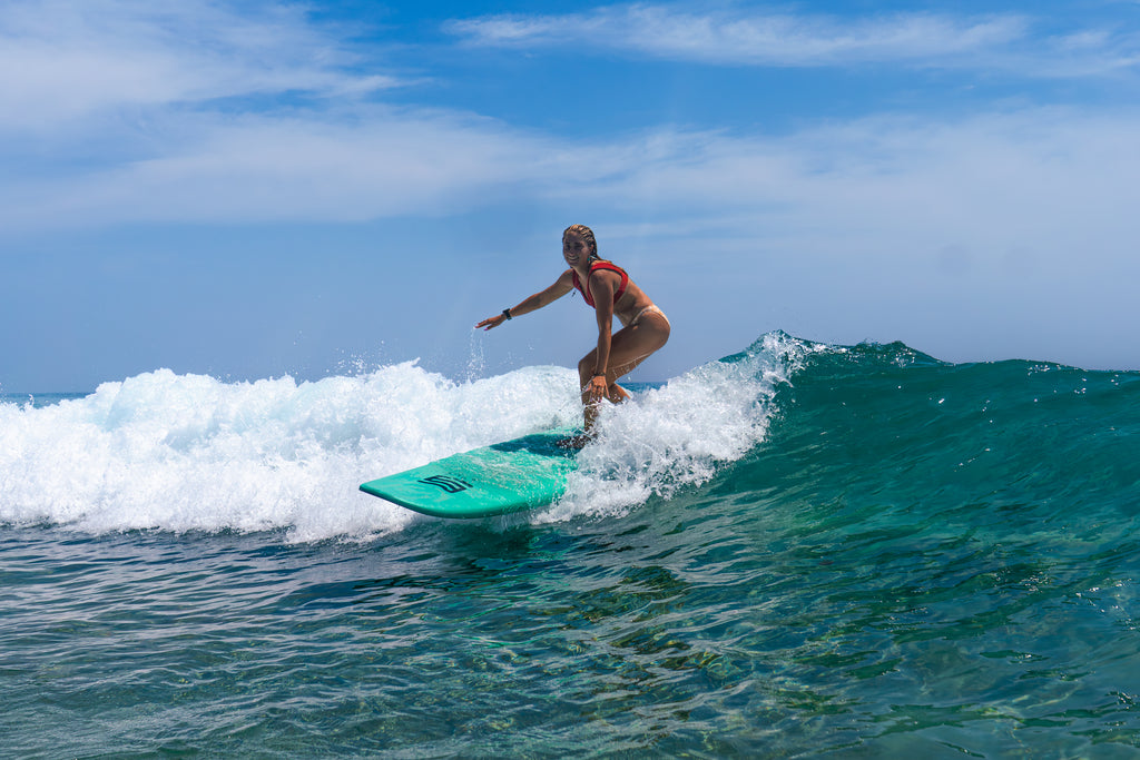 Student catching waves during Surfing 201