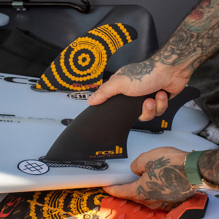 FCS II Otis Carey PG Twin + 1 Fin Set-Black/Orange
