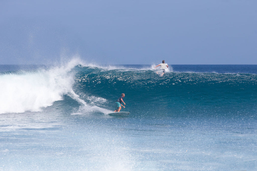 REAL Surf Coach working with surfers at a destination