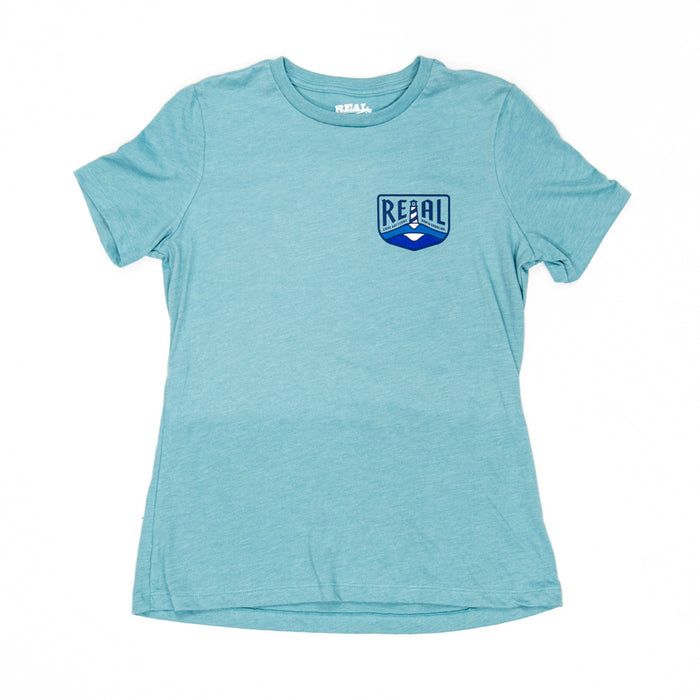 REAL Wmn's Lighthouse Badge Tee-Heather Blue Lagoon